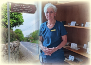 Nurse Noelien Delahunty in front of the archive of objects from the community hospital museum she created in Abbeyleix Community Nursing Unit.